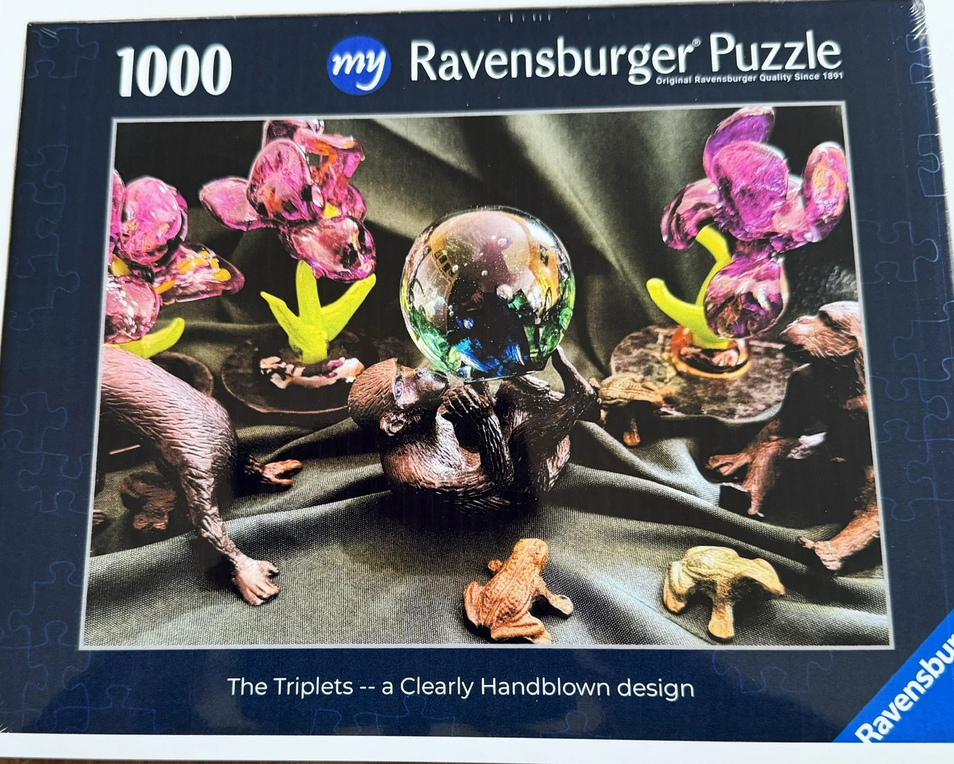 The Triplets — Ravensburger jigsaw puzzle box.