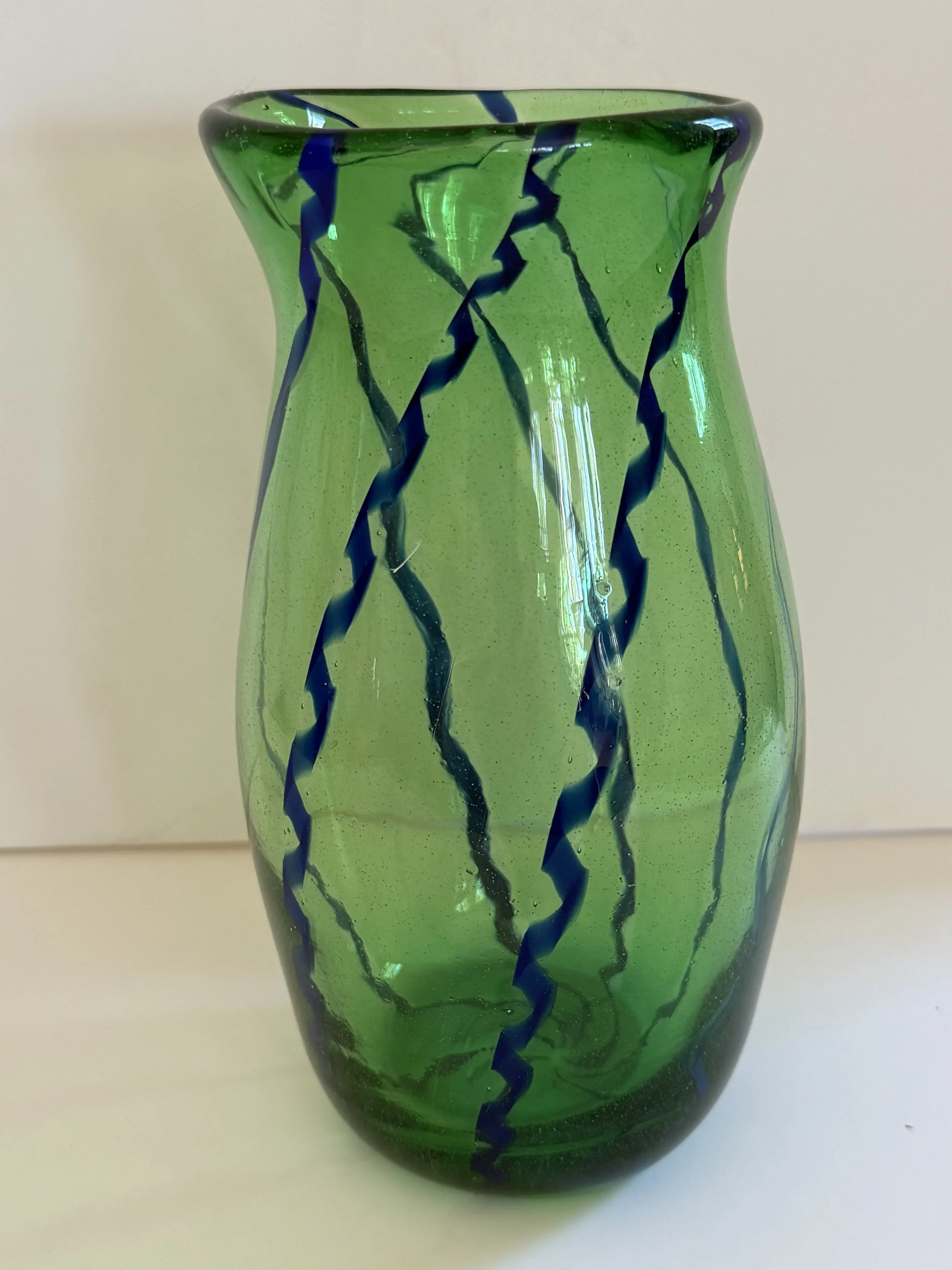 Handblown glass vase: Transparent green with handmade dark blue cane.