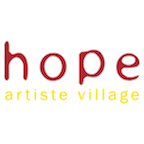 Logo for Hope Artieste Village featuring stylized text with 'hope' in red and 'artiste village' in yellow