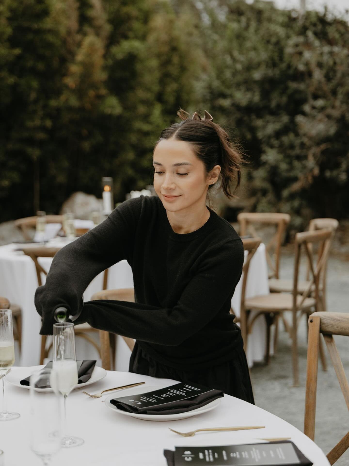 Emi Reese Wedding Planning Pouring Champagne
