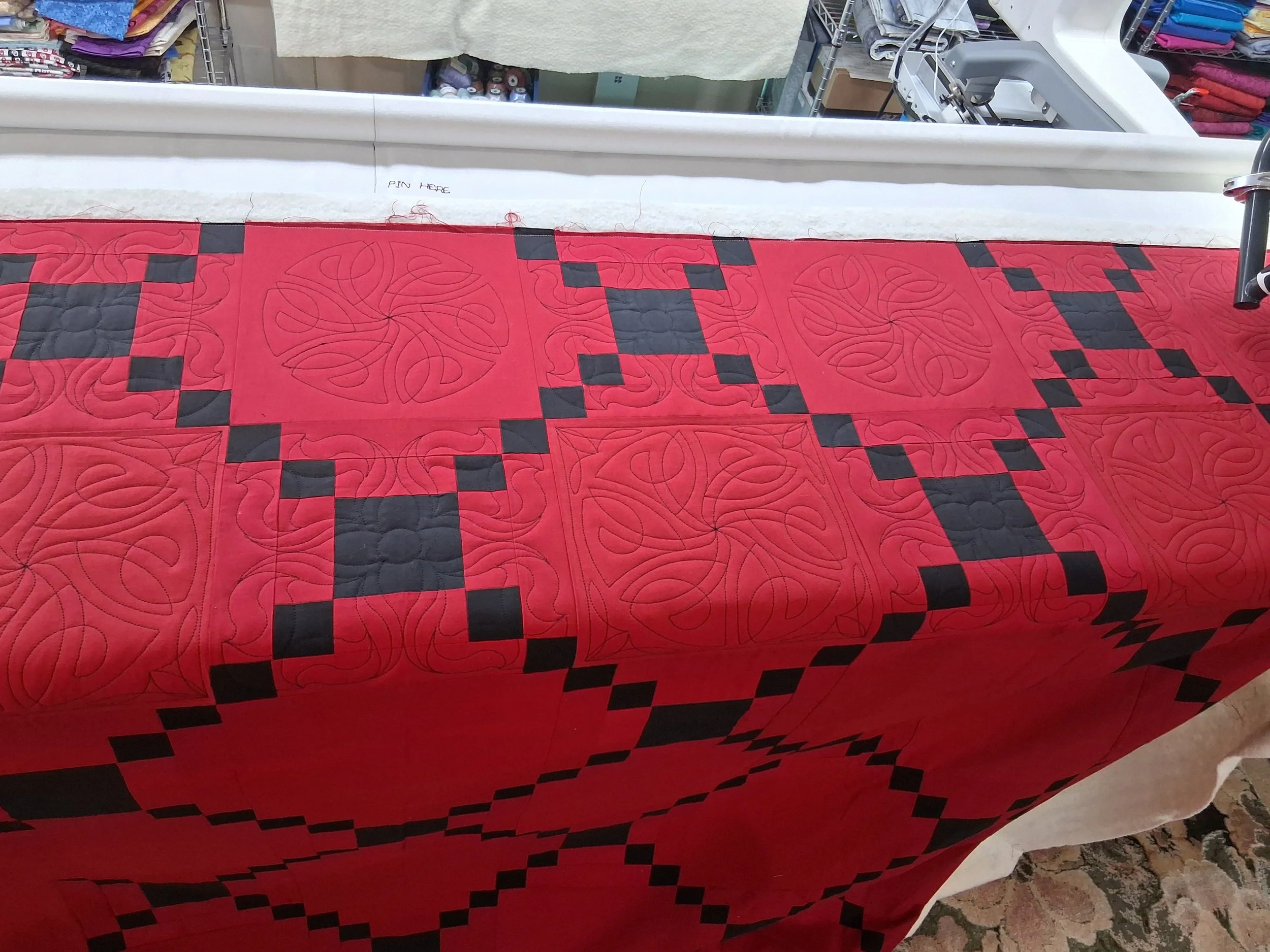 Irish chain quilt on on the table.jpg