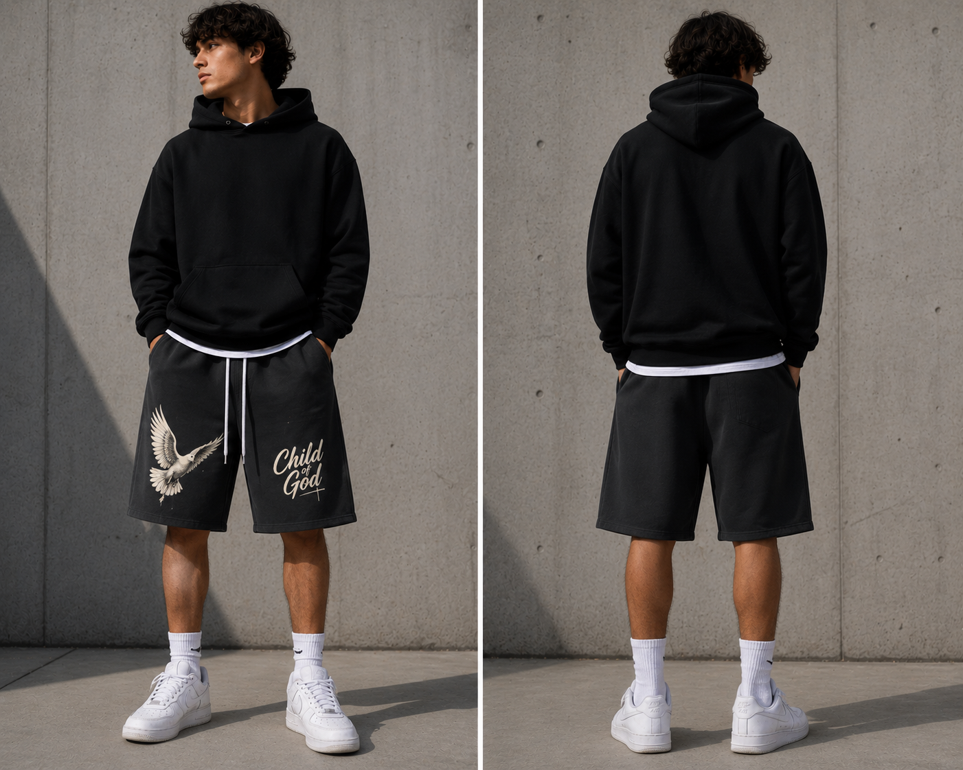 A young man standing outdoors against a gray wall, wearing a black hoodie, black shorts with a dove and the words "Child of God" printed on them, white socks, and white sneakers.