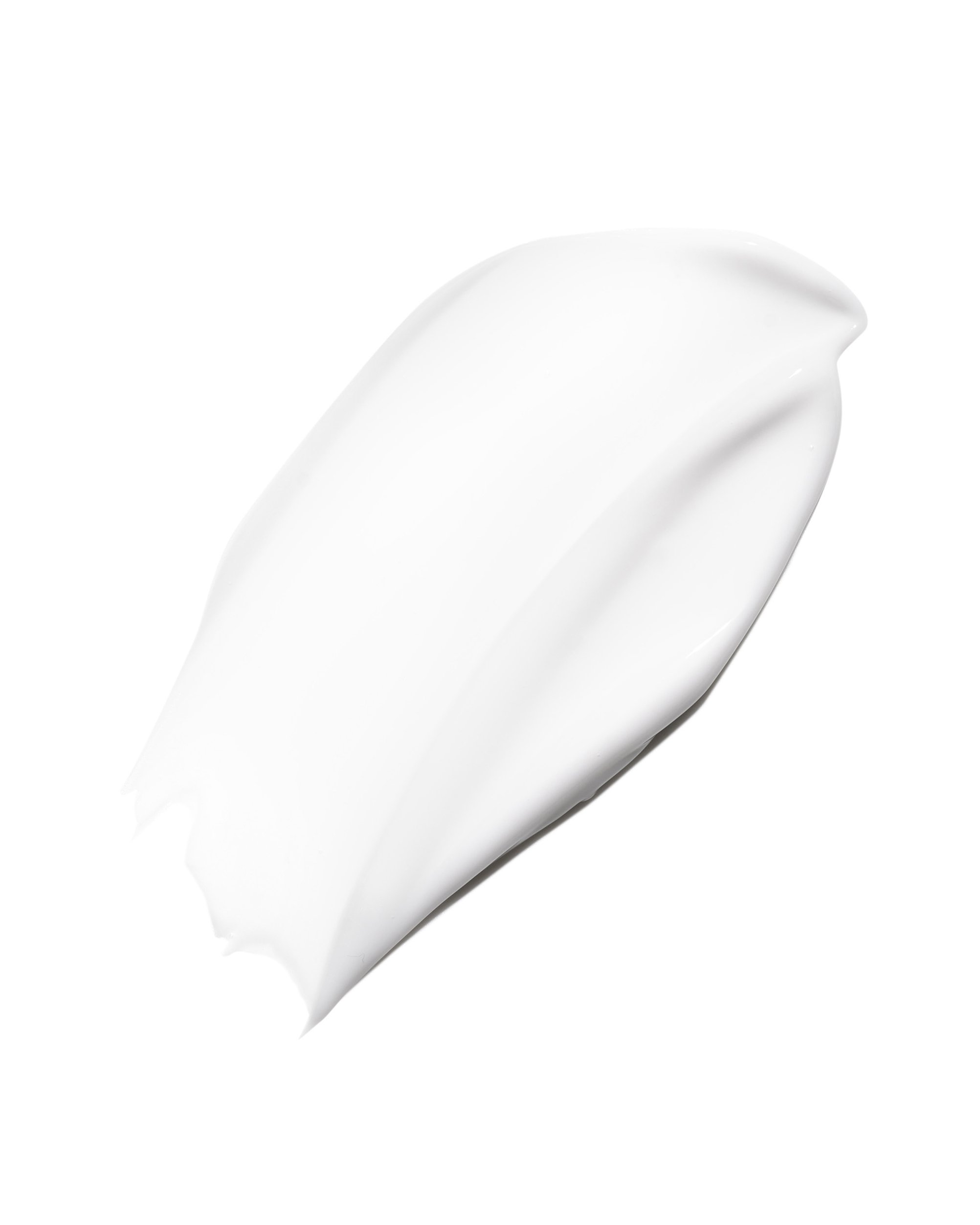 Close-up of a dollop of white cream or lotion on a white background.