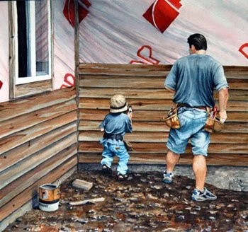 A man and a child working on a wooden wall outside a house, with tools and a bucket nearby.