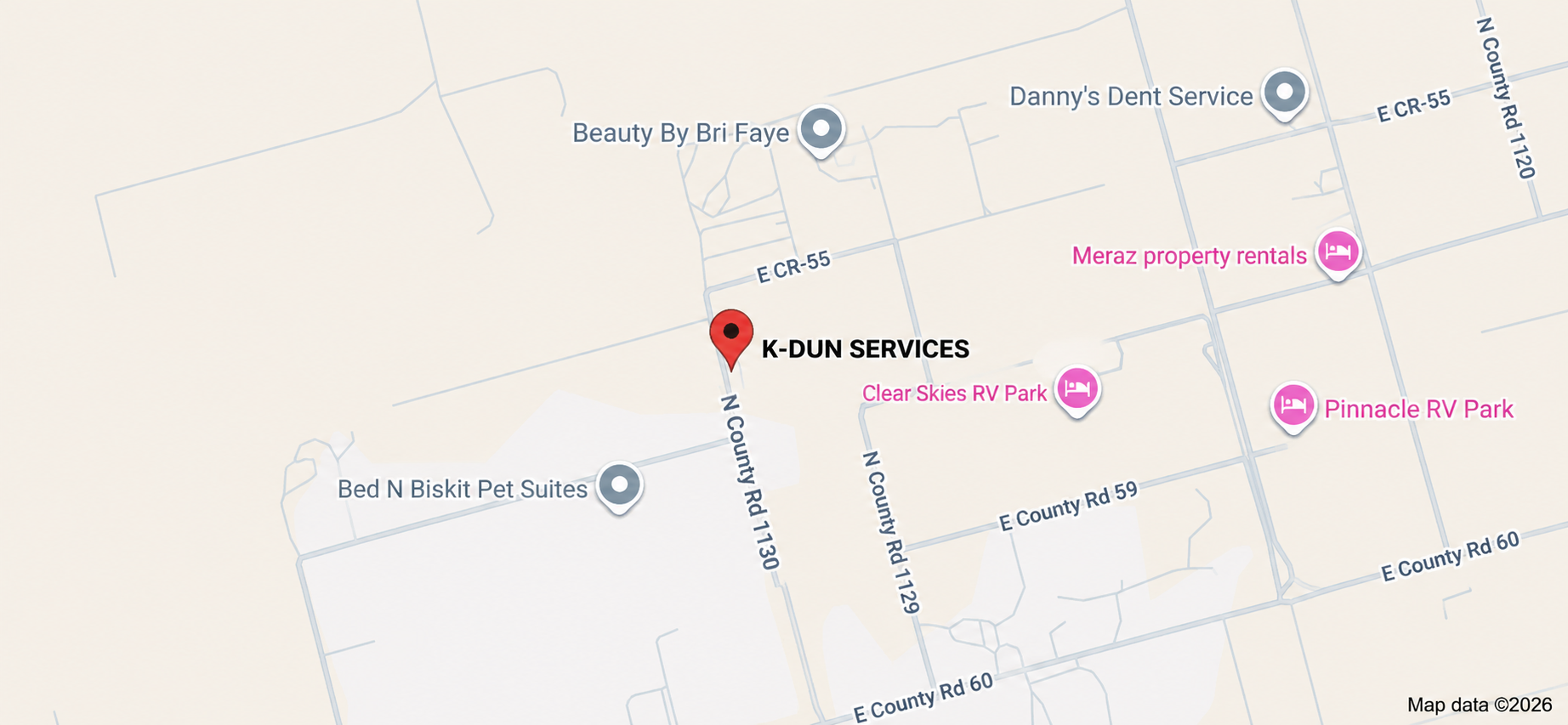 Map showing the location of K-DUN SERVICES on North County Road 1130 near East County Road 55, with nearby businesses including Bed N Biskit Pet Suites, Beauty By Bri Faye, Danny's Dent Service, Meraz Property Rentals, Clear Skies RV Park, Pinnacle RV Park, and other roads.