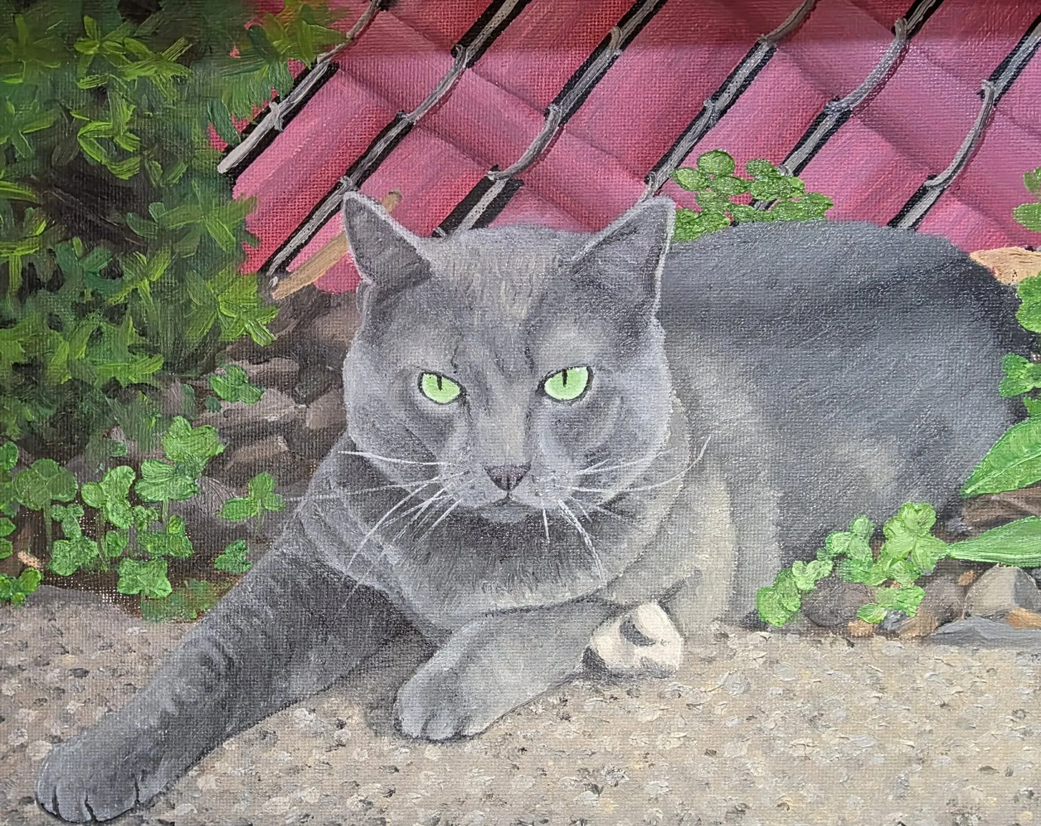 Painted outdoor scene featuring a gray cat with green eyes sitting on a stone surface, surrounded by green plants, with a pink, black, and gray towel hanging on a black metal railing in the background.