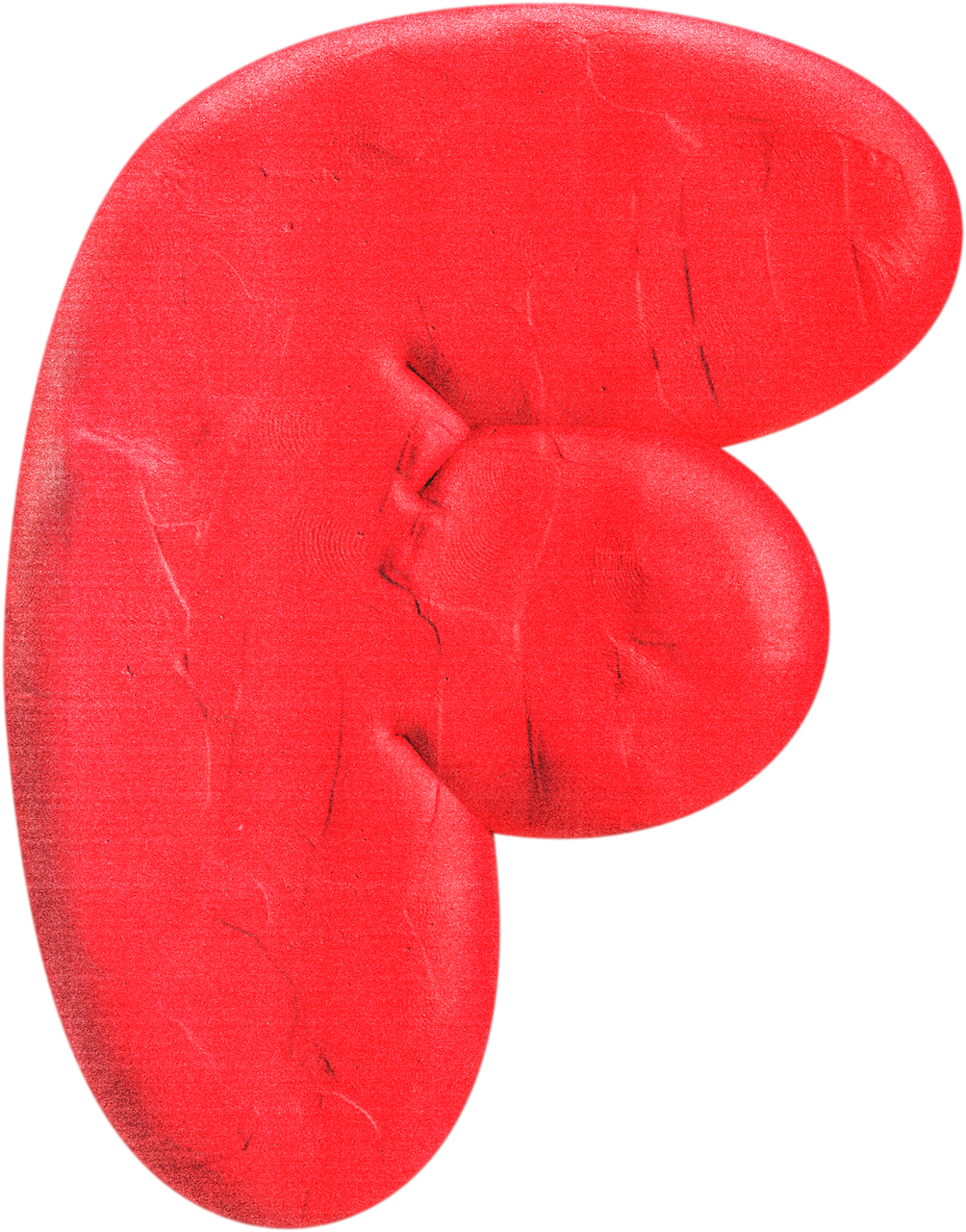 Close-up of a red heart-shaped object, possibly made of a textured material, with visible lines and cracks.