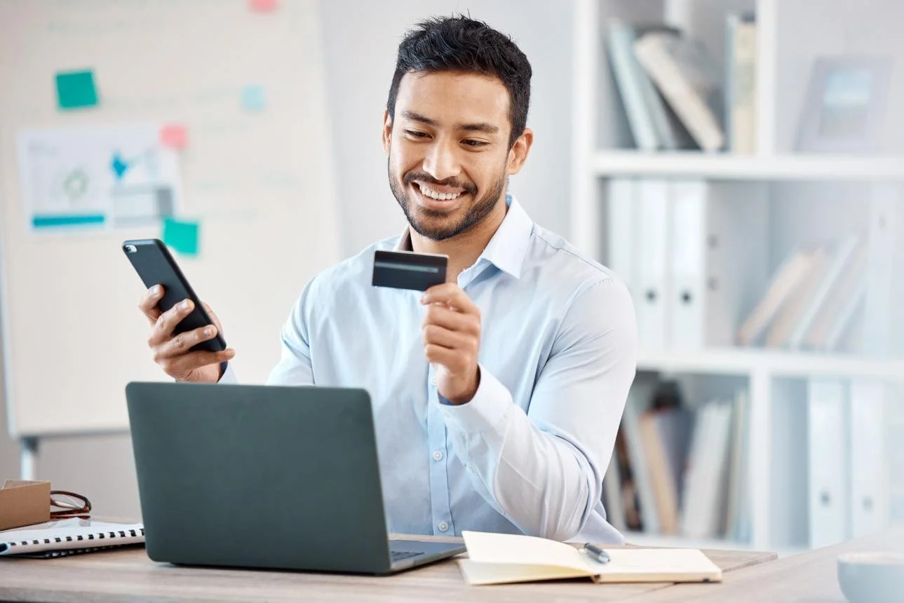 Customer researching a purchase on a smartphone before buying, representing how social proof and online reviews build consumer confidence.