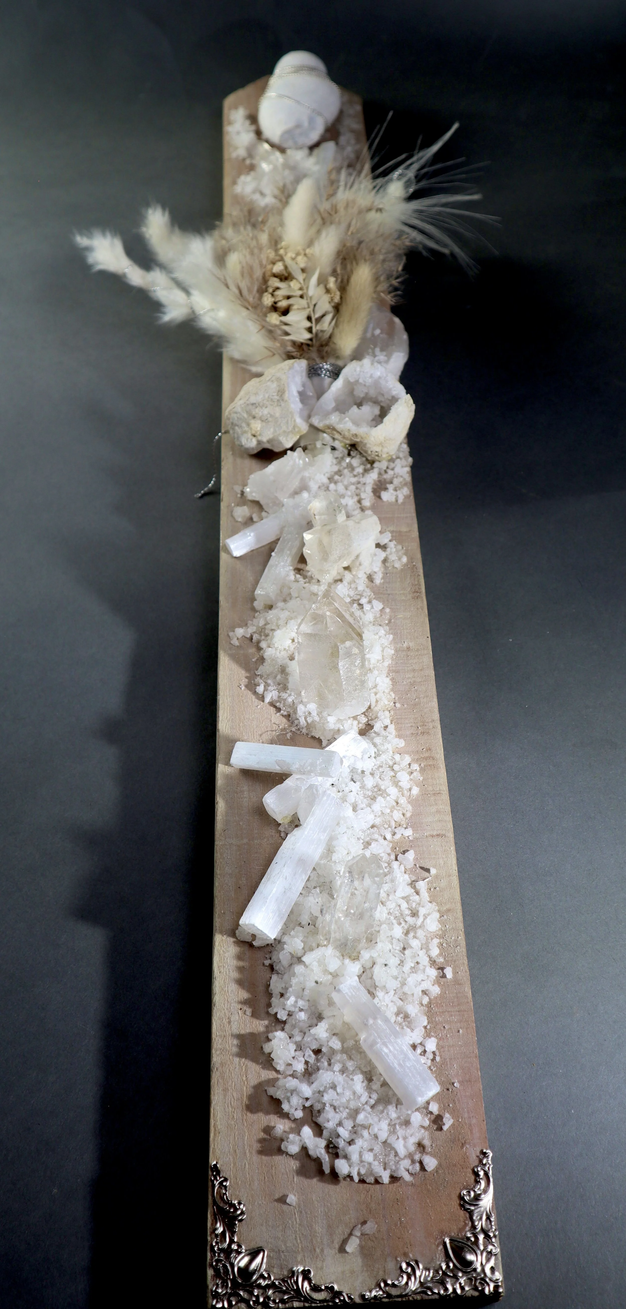 Vertical white wall art with selenite, quartz and melanite for modern narrow wall decor