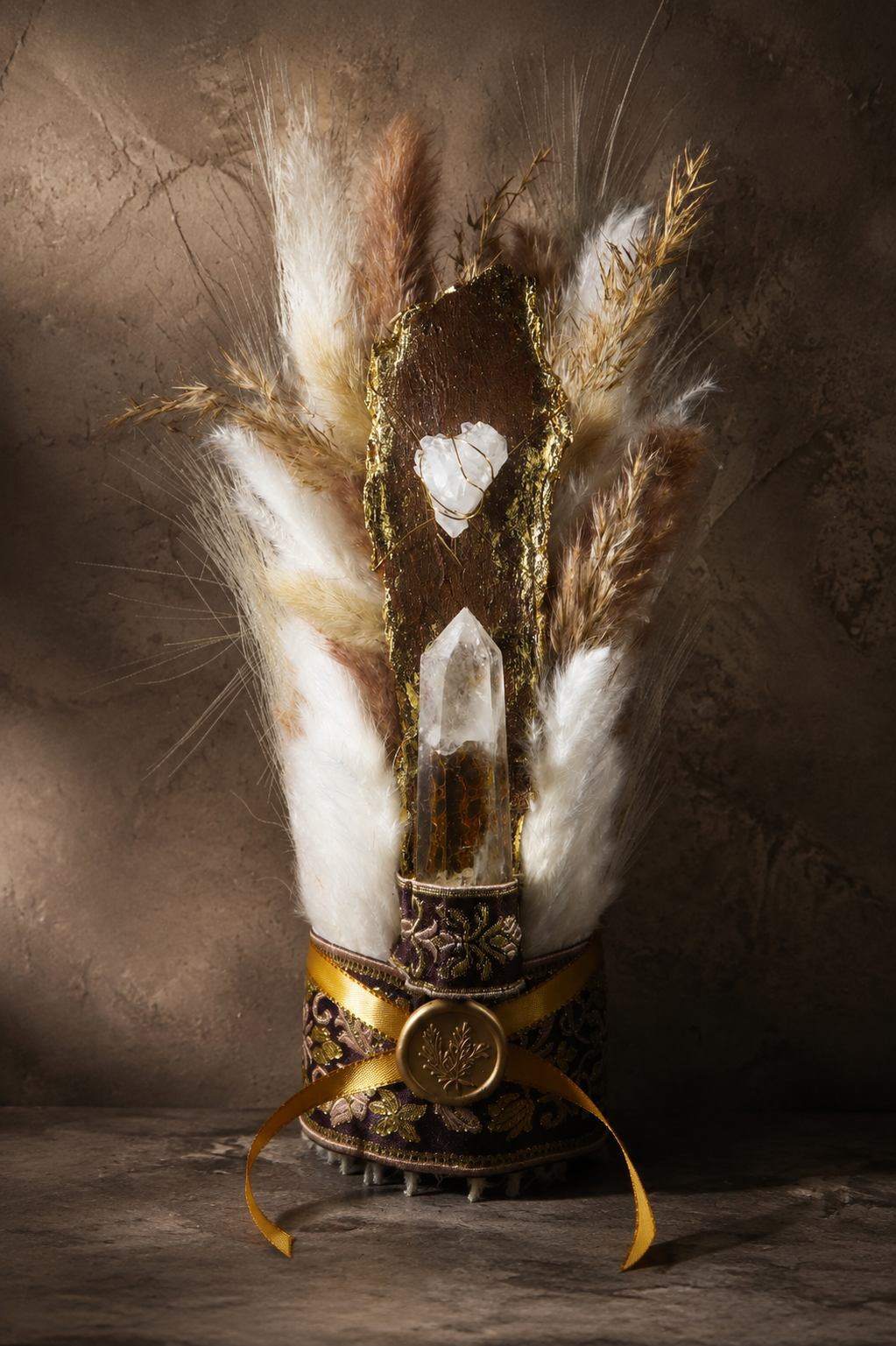 Golden Citrine Bark
Original sculptural mixed-media art object combining natural wood bark, citrine point, clear quartz, selenite, gold leaf, embroidered textile and dried botanical elements.
13 × 6 × 6 in — Sold