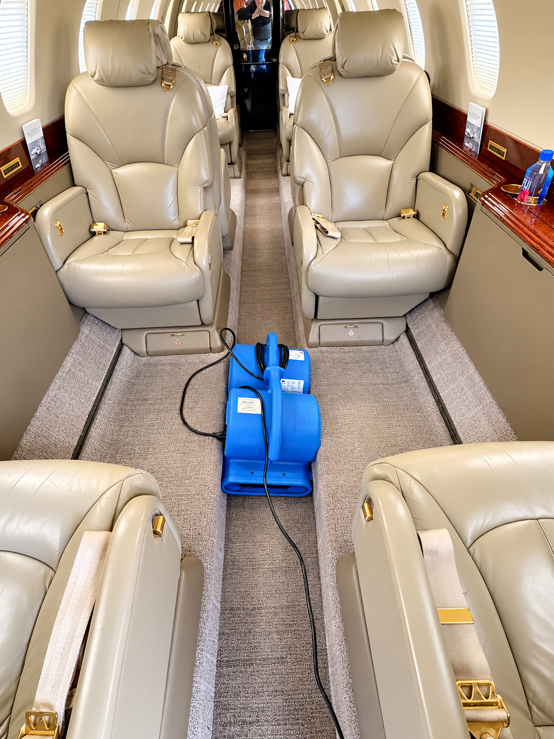 Midsize-cabin jet, interior carpet shampooing & air drying, mobile aircraft detailing across San Diego, CA