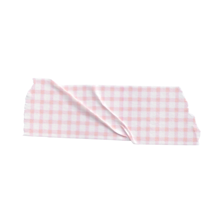 A pink and white checkered cloth, partially folded, on a black background.