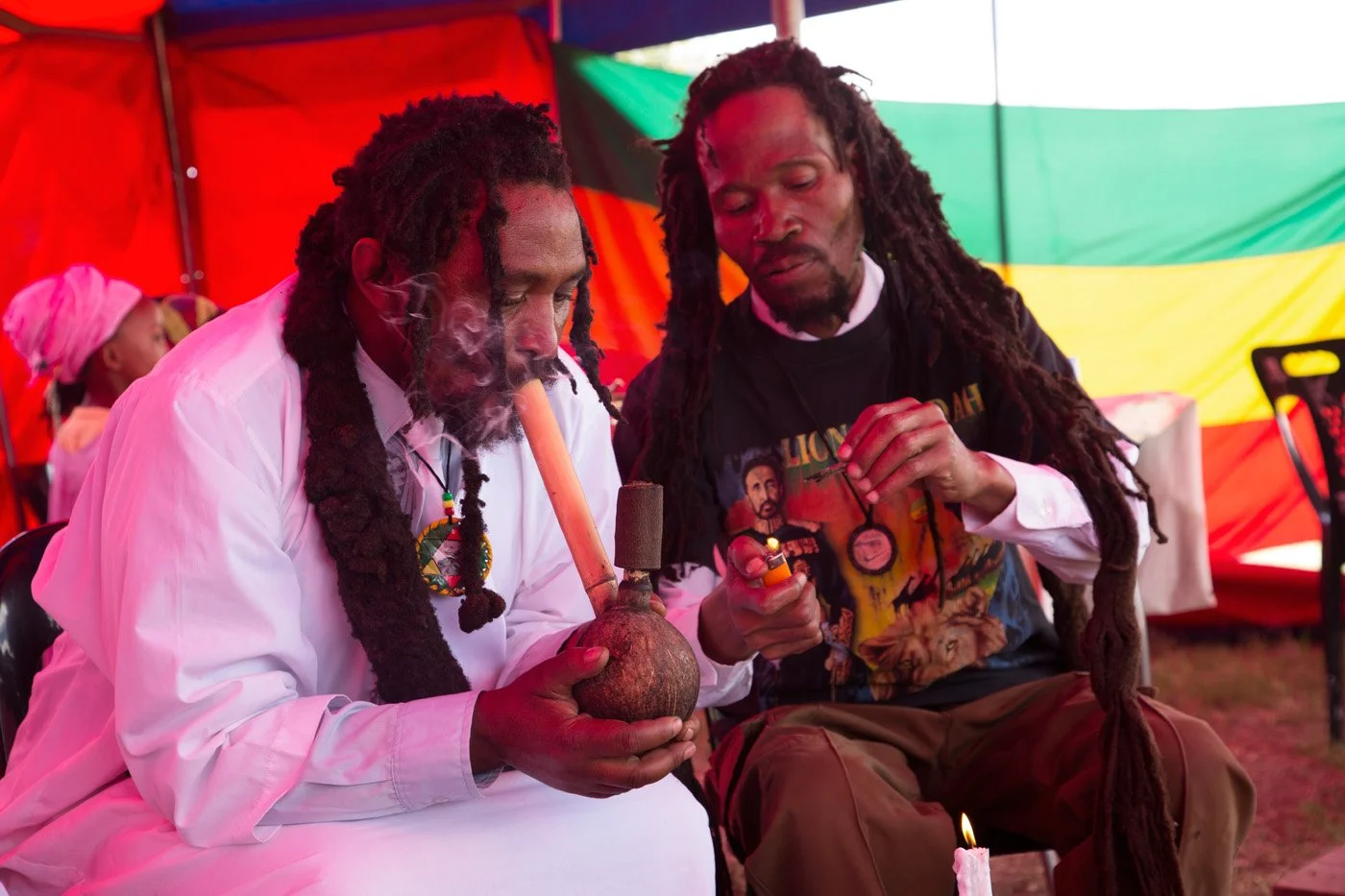 Elders light the chalice to smoke the sacred herb.