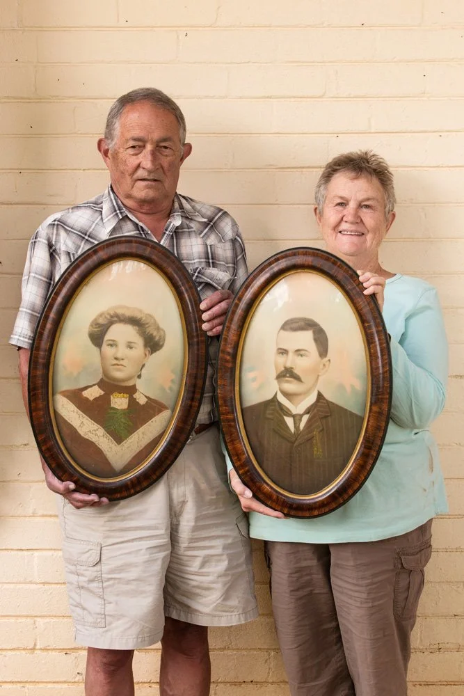 Jan Karsten and his wife Annetjie hold the framed, hand-coloured black-and white portraits of Jan's maternal grandparents, Petrus Johannes and Beatrix Petronella Catharina Louwrens. (Dewetsdorp, Free State).