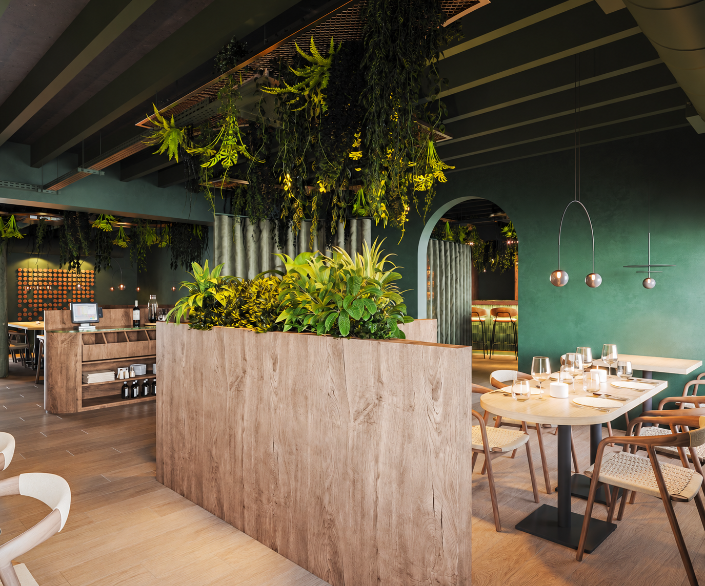 Interieur van Bistro Verde in Keerbergen met groene wanden, hangende planten, houten meubels en een gedekte tafel