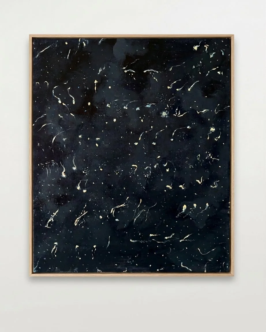 Abstract painting named "she wore the moon" with midnight blue background and soft eggshell markings representing the night sky,  framed in a thin light oak frame and hung on white wall.