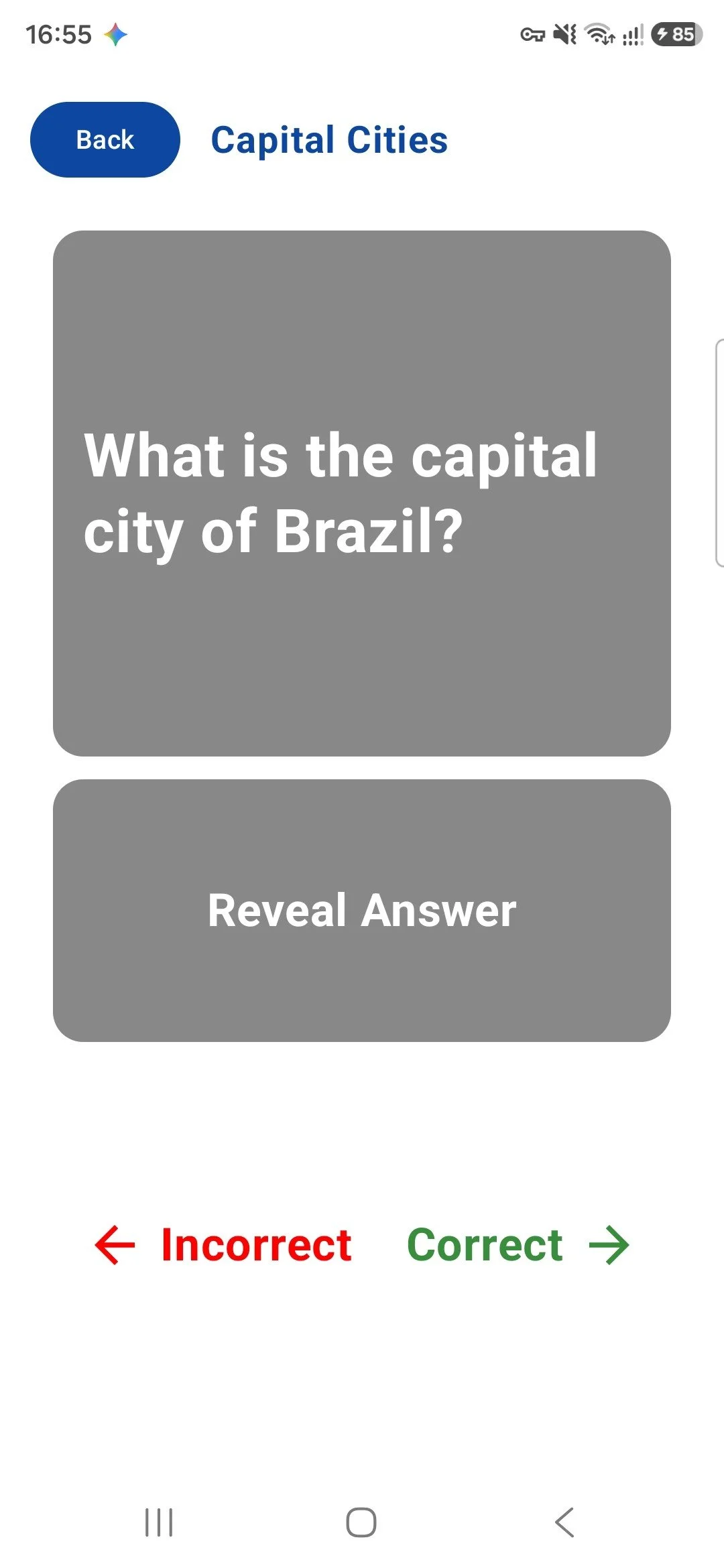 Mobile app screen with a question asking for the capital city of Brazil, with options to reveal the answer, and indicators for incorrect and correct responses at the bottom.