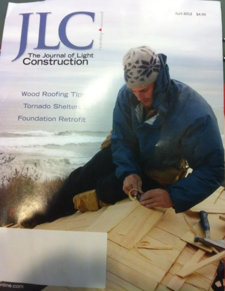 Cover of a magazine titled 'JLC The Journal of Light Construction' with a man working on a wooden roof in a coastal area, wearing a blue jacket and a winter hat.