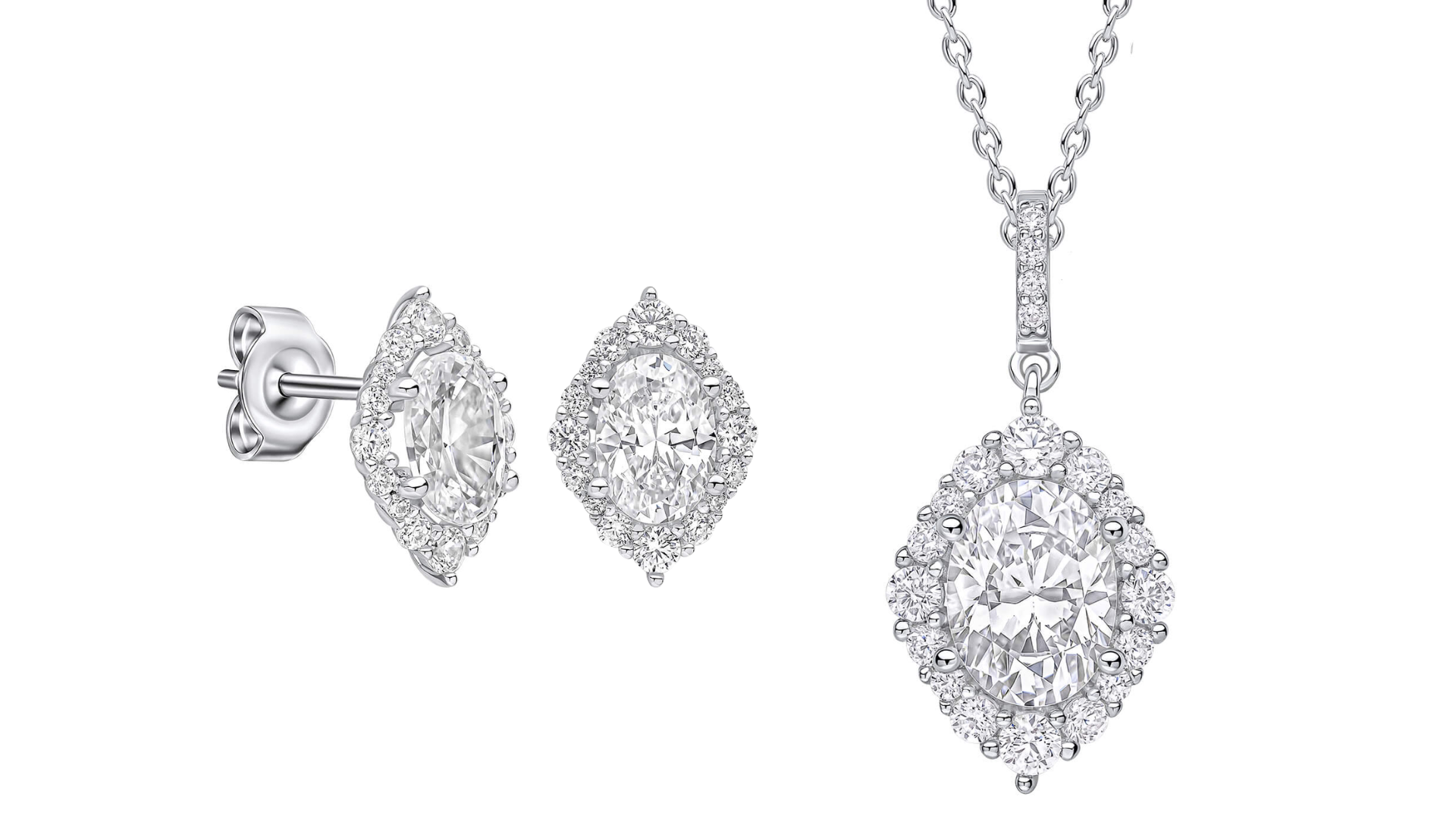 Schmuckset aus Diamanten, bestehend aus Ohrringen und einem Anhänger an einer Kette, alle mit großen ovalen Diamanten und umgeben von kleineren Diamanten, in Silberfassung.