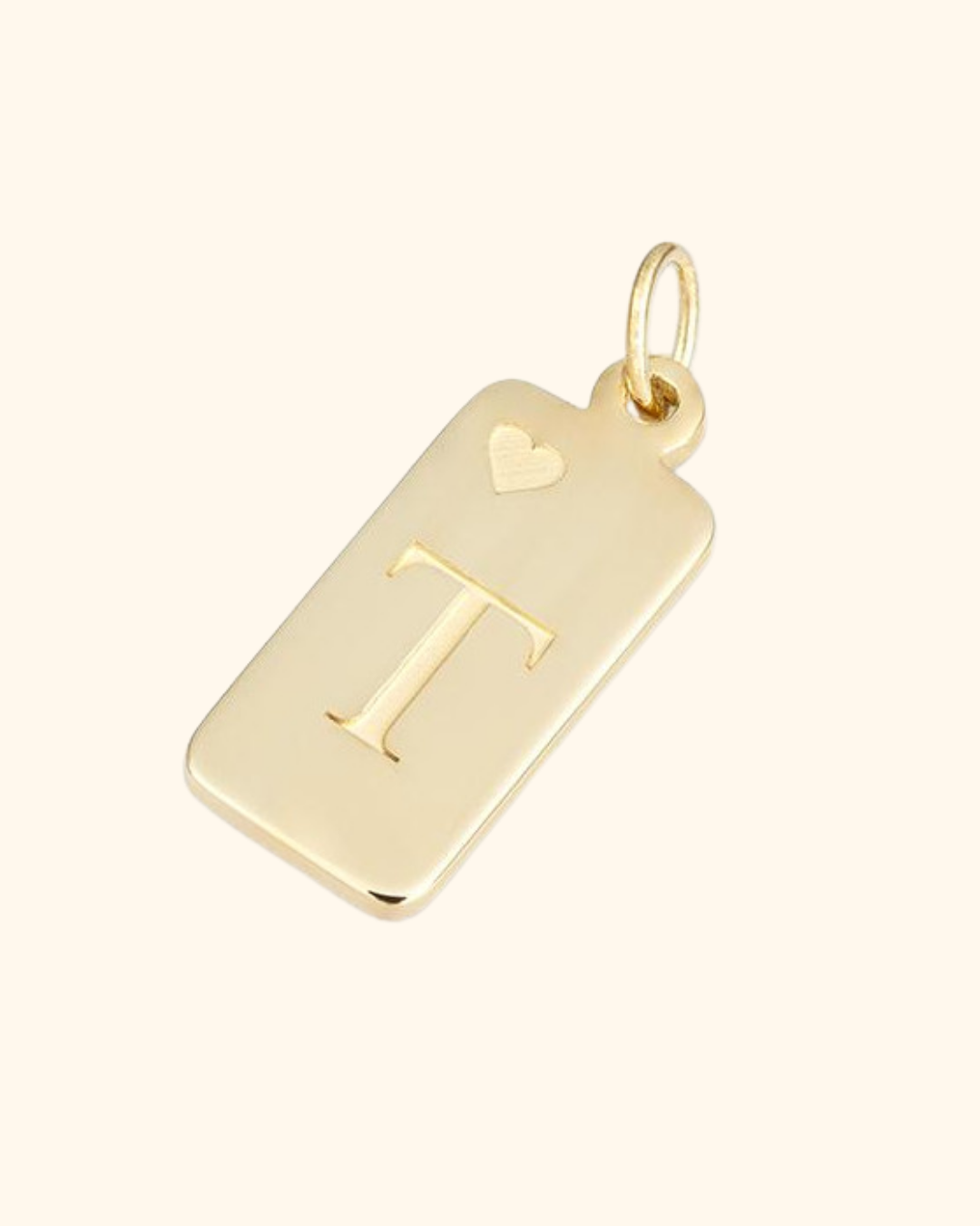 Goldener Anhänger mit der Aufschrift 'I' und einem kleinen Herz darüber.