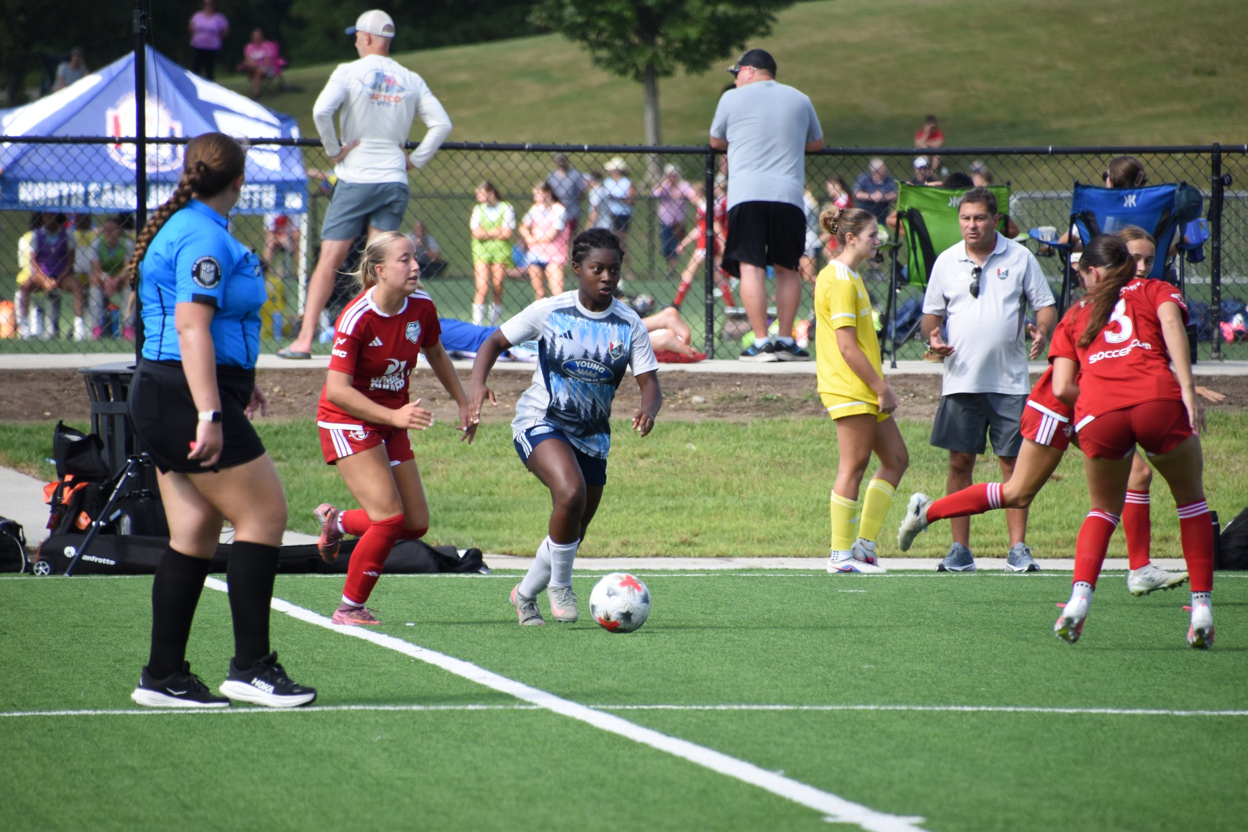 Michal Wilburn dribbling the soccer ball
