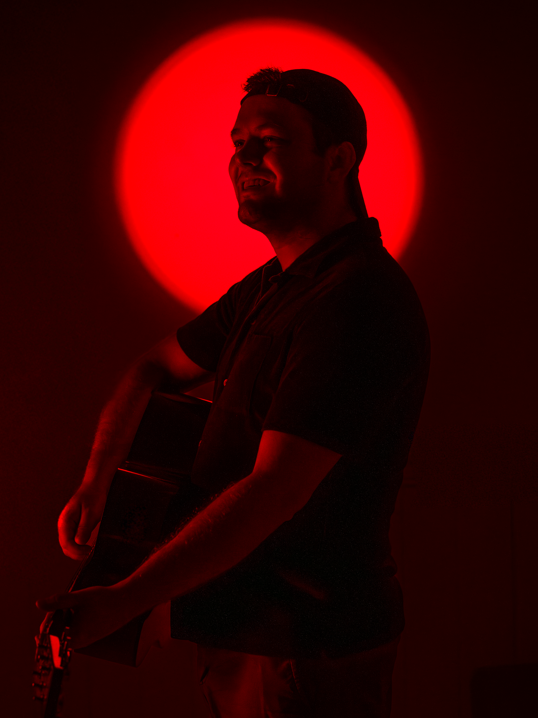 Bass Silhouette Under Crimson Glow2.png