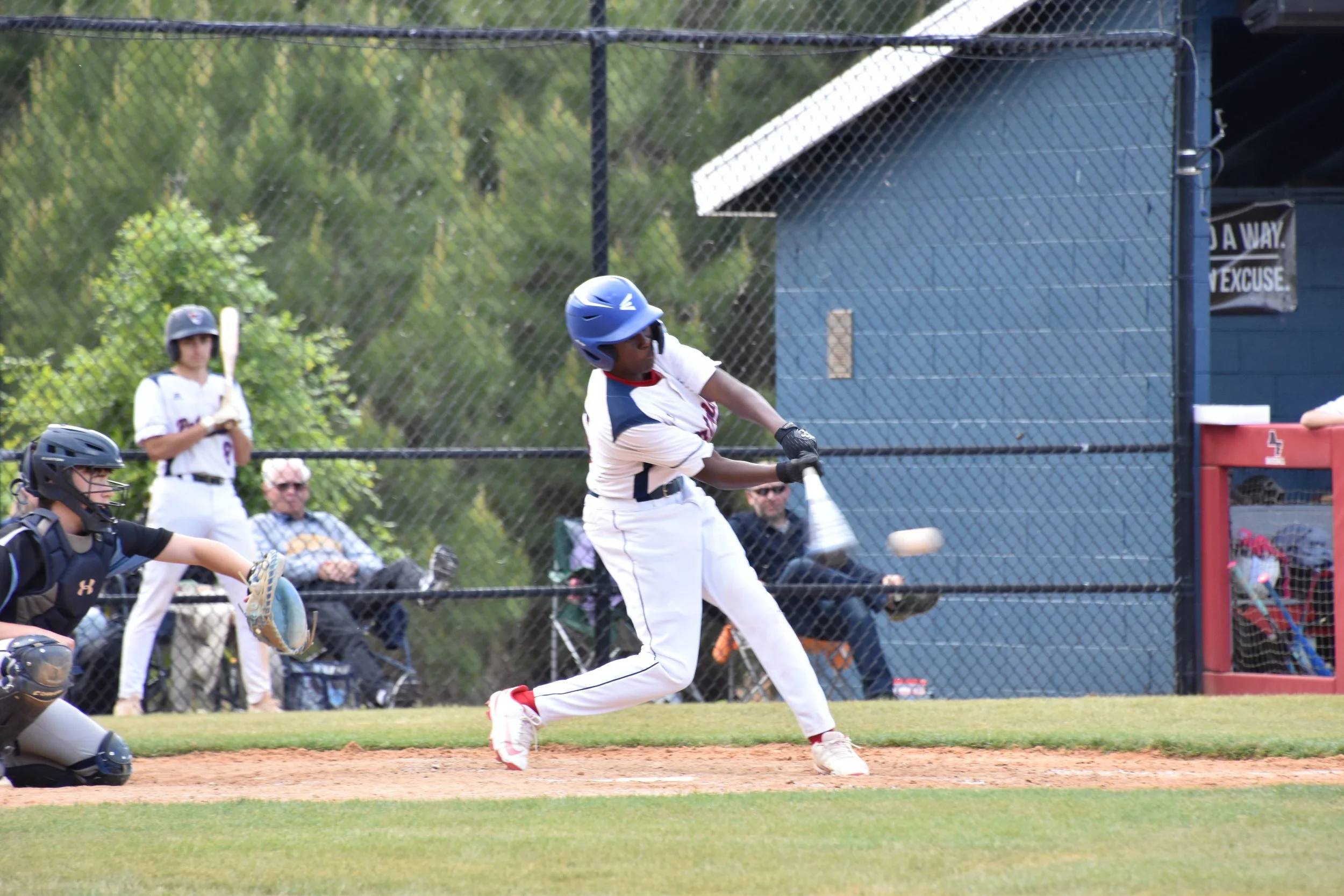 Gabriel Wilburn hitting baseball