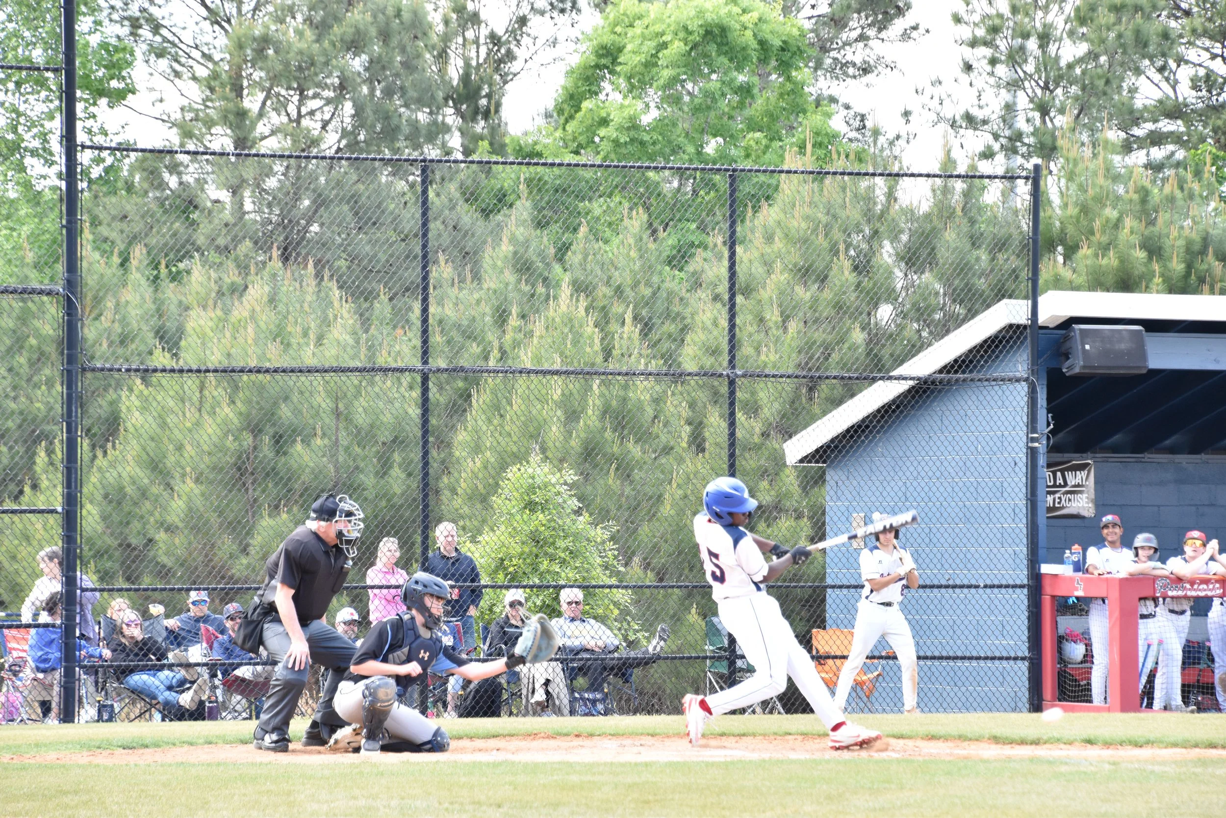 Gabriel Wilburn hitting baseball