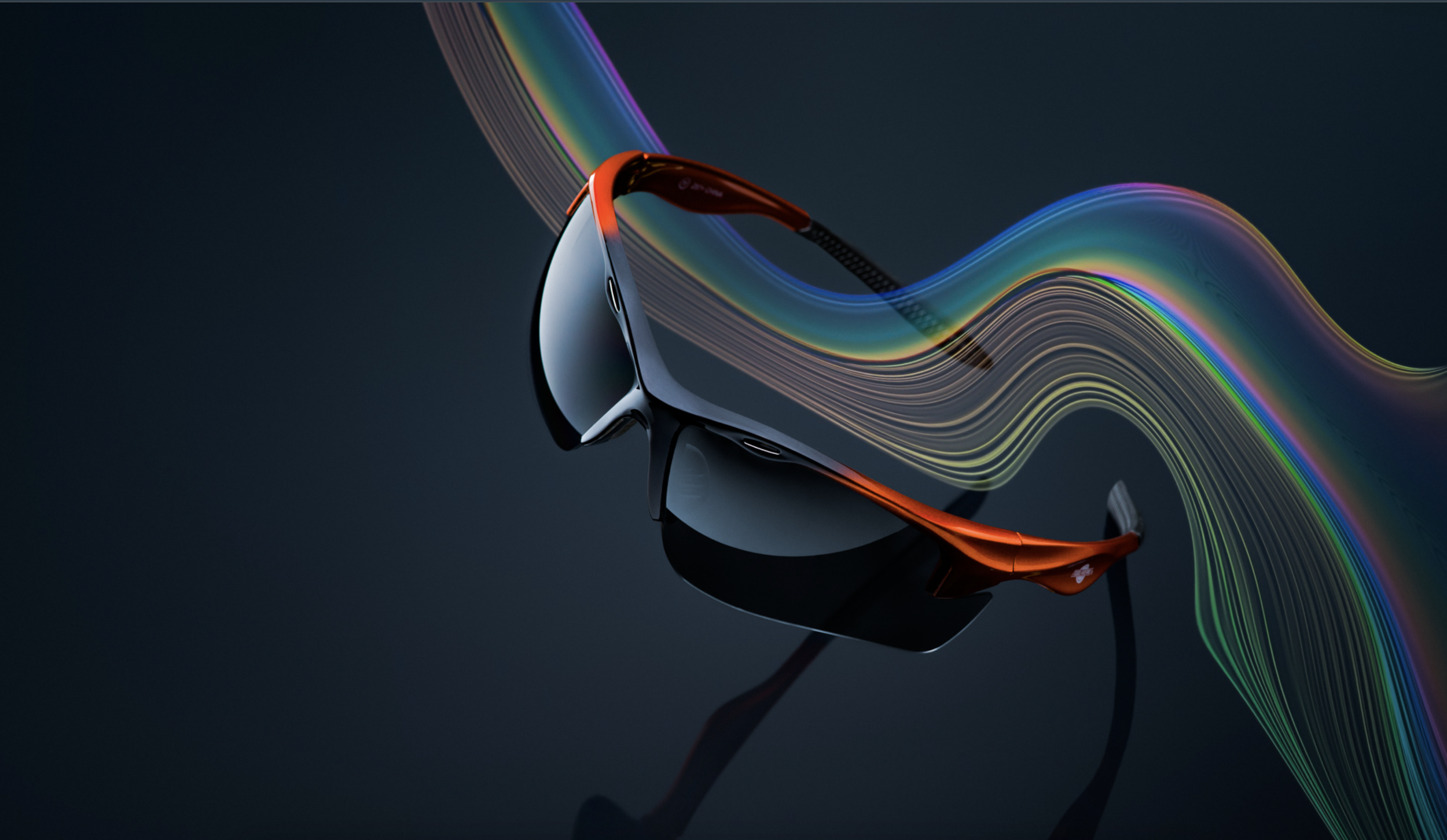 Close-up of a sleek black virtual reality headset with colorful rainbow-like light streaks flowing from it, set against a dark background.