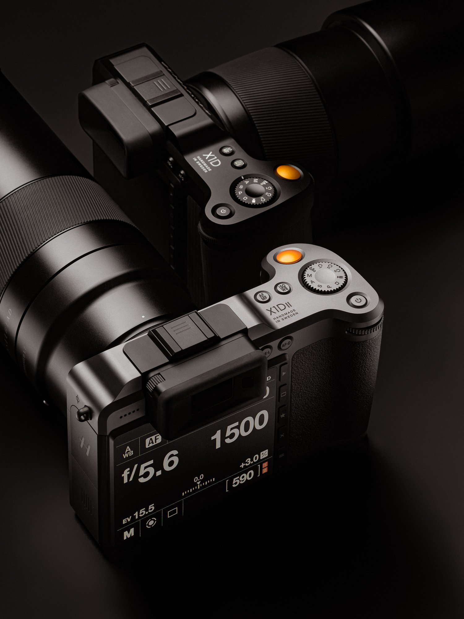 A mirrorless camera with a large zoom lens and a separate viewfinder screen showing camera settings and image preview, set against a black background.