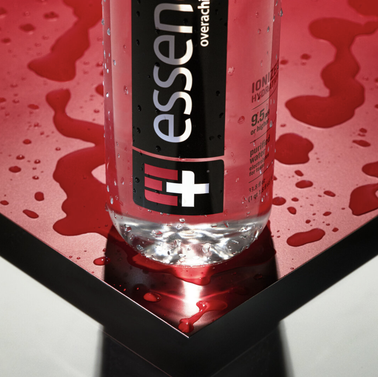 Essentia Water bottle in a branded product photography campaign.