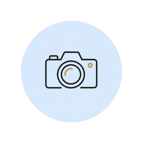 Placeholder image with an icon of a camera inside a light blue circle.
