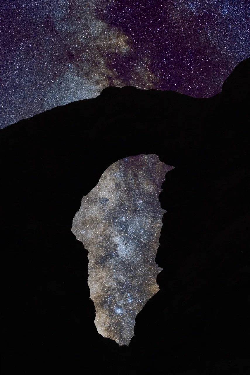 Silhouette of a turret arch formation in the windows section of Arches National Park, revealing a starry night sky and the Milky Way galaxy behind it.