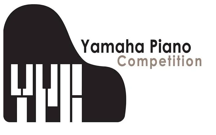 Graphic design for a Yamaha Piano Competition, featuring a stylized black piano with white keys and text that says 'Yamaha Piano Competition'.