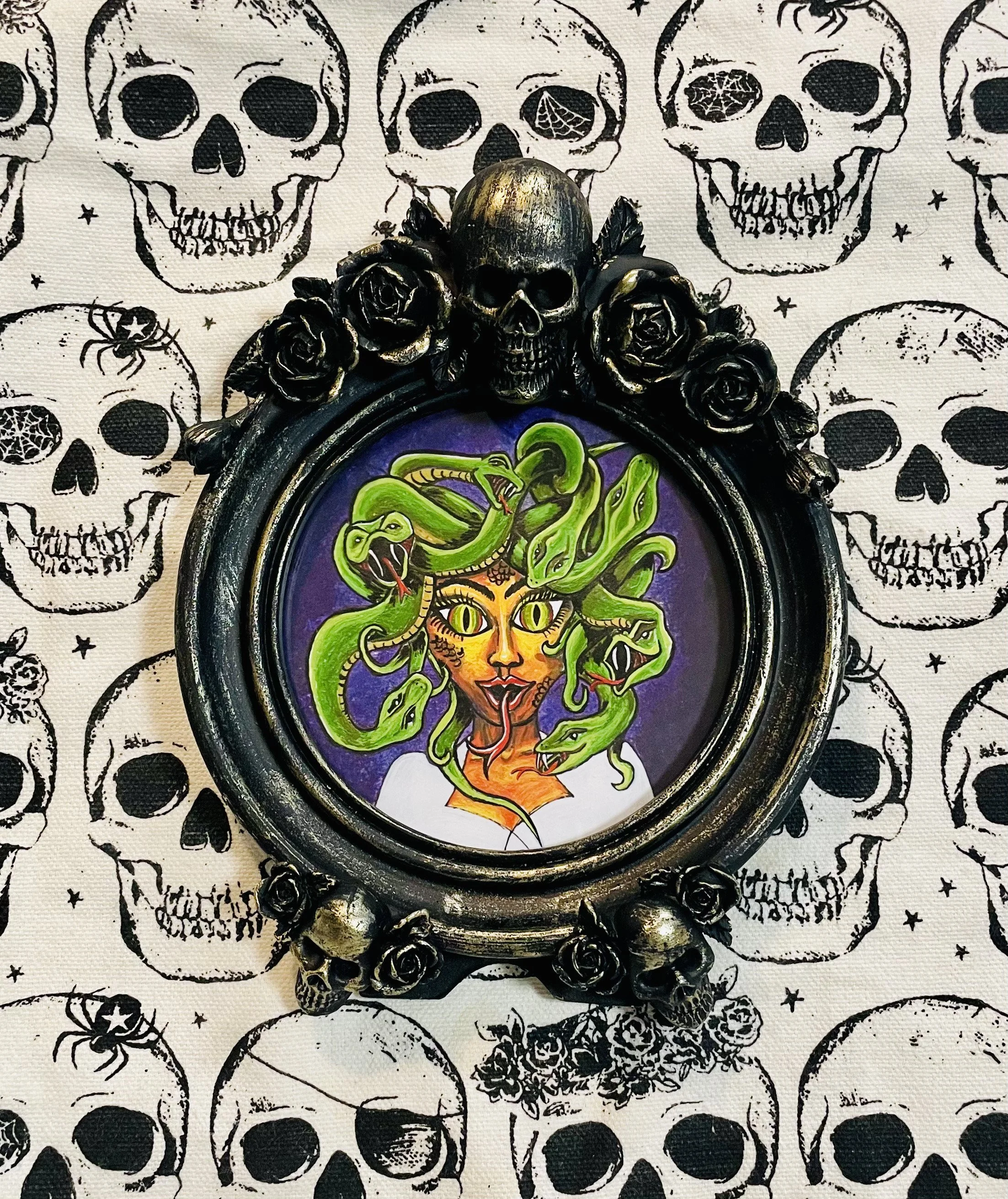 Skull framed Medusa