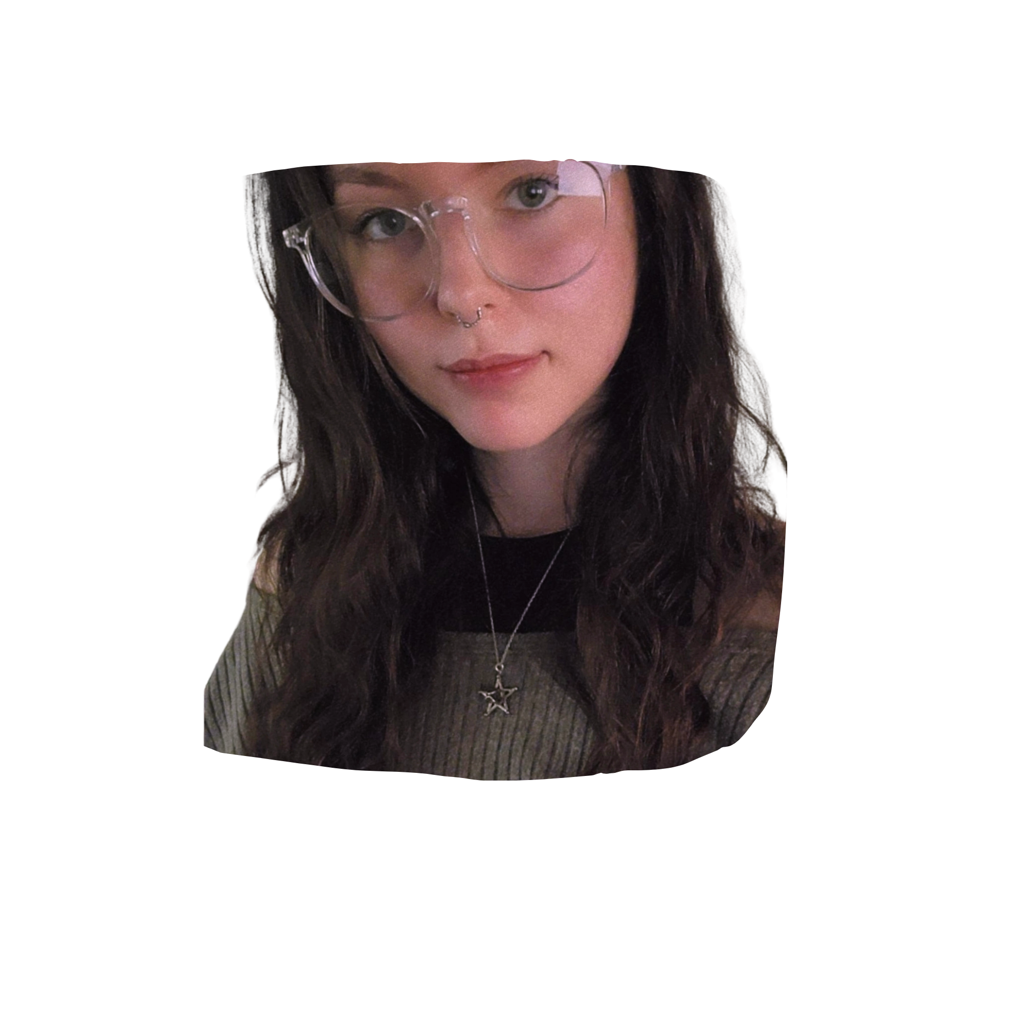 Close-up of a woman with long dark hair, wearing glasses with a star-shaped pendant necklace, looking at the camera.
