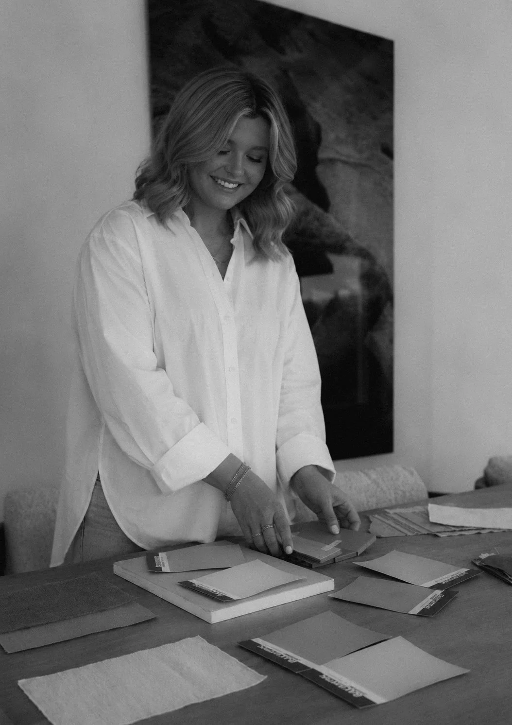 Interior designer reviewing fabric and finish samples