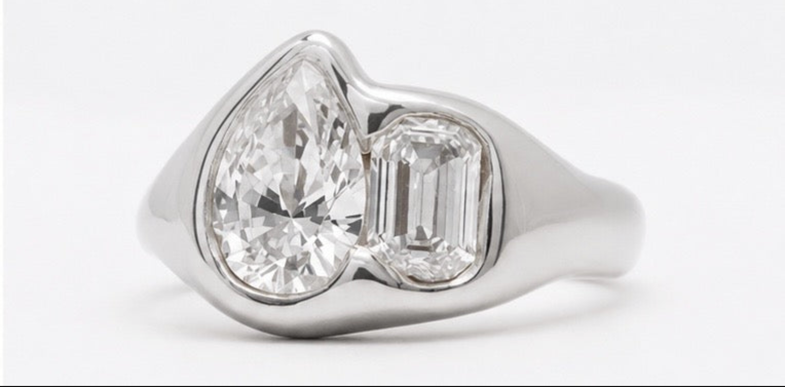 18k white gold toi et moi ring with pear-cut and emerald-cut lab-grown diamonds in organic bezel settings