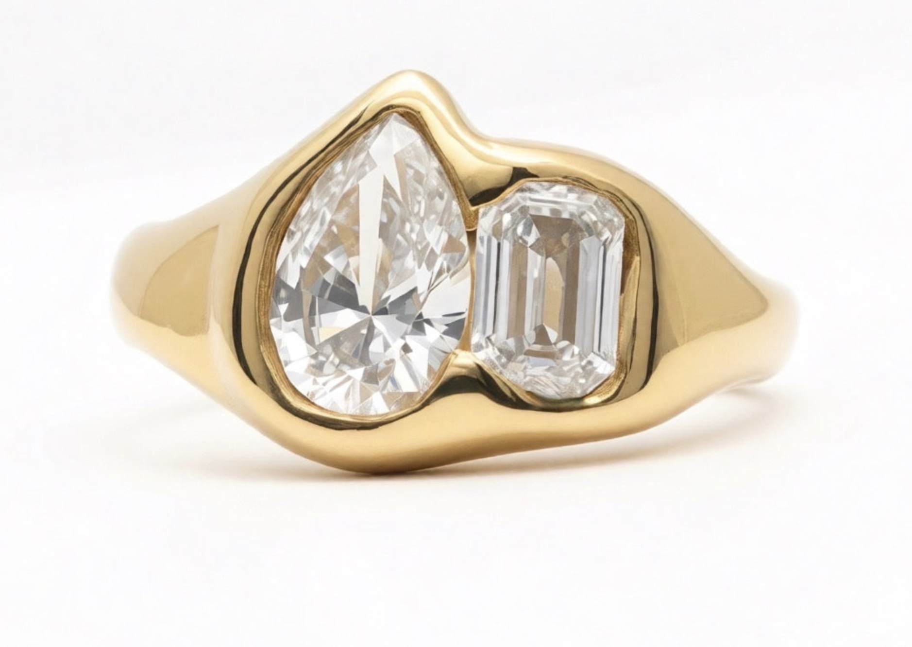 18k yellow gold toi et moi ring with pear-cut and emerald-cut lab-grown diamonds in organic bezel settings