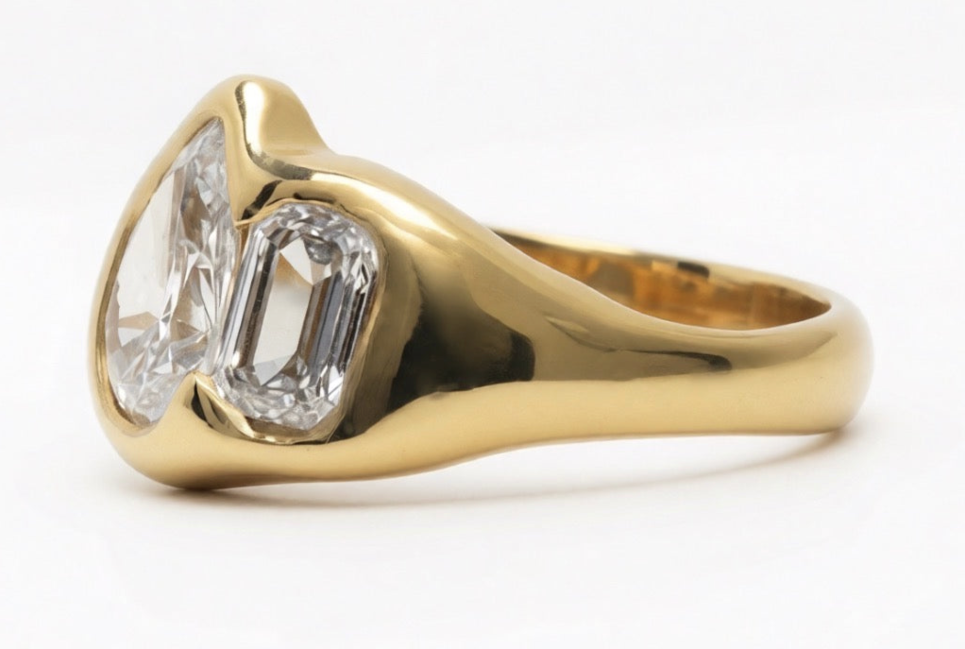 18k yellow gold toi et moi ring with pear-cut and emerald-cut lab-grown diamonds in organic bezel settings