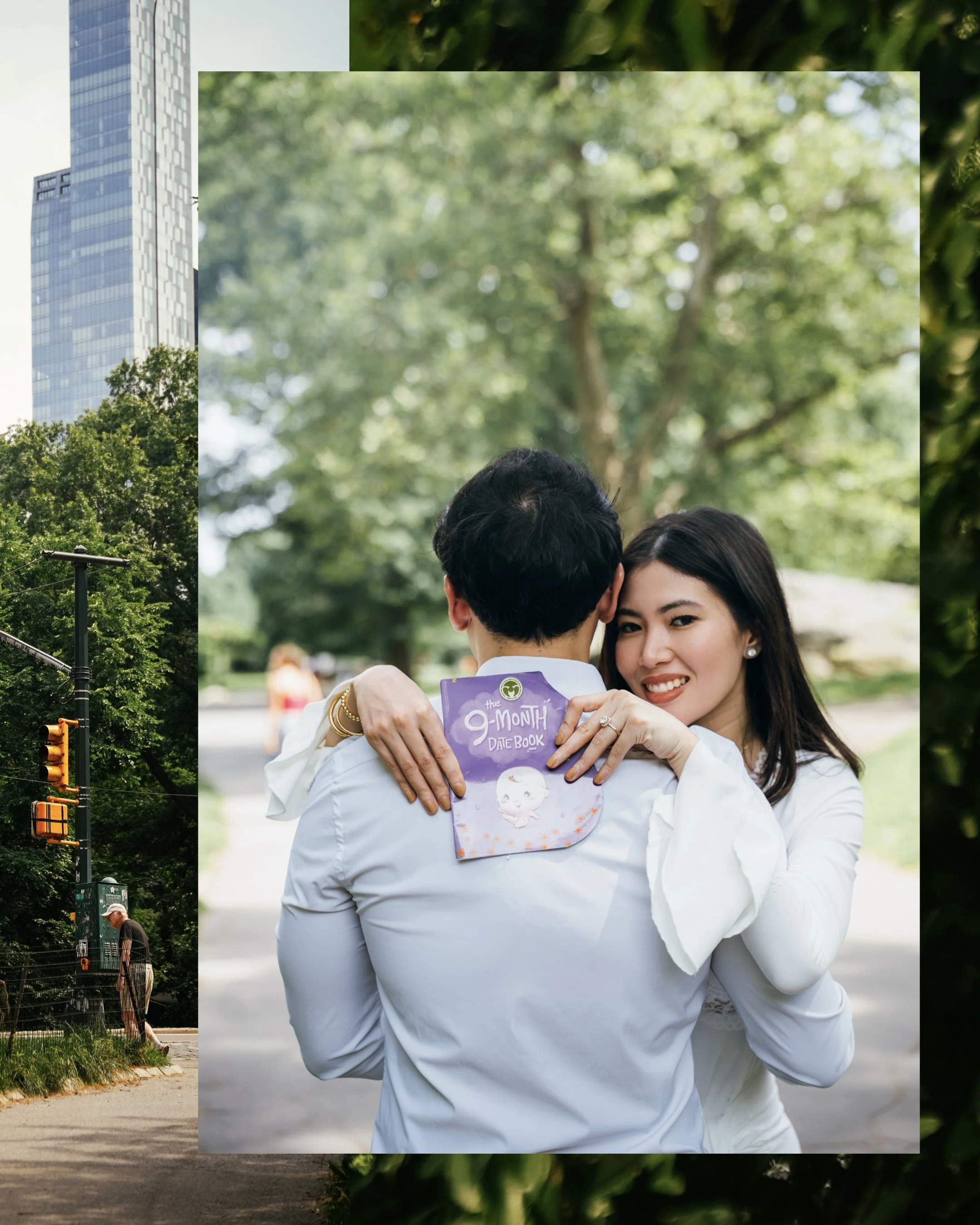 A couple dancing outdoors in a park, with the woman holding a purple notebook that says '9-Month Date Book,' surrounded by trees and greenery.