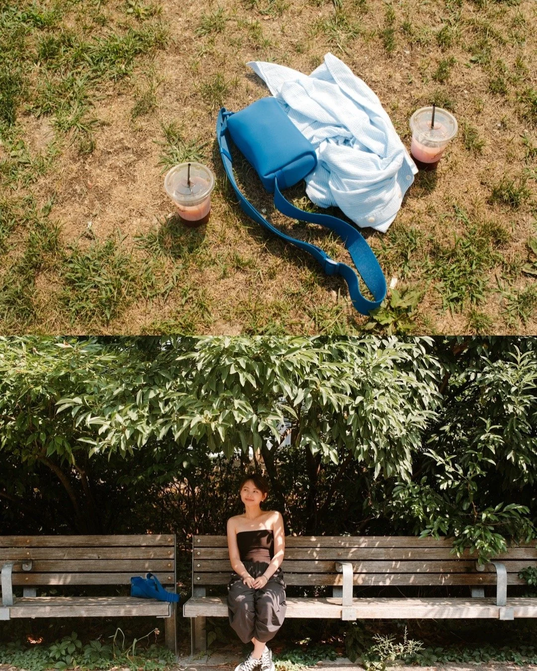 A woman sitting on a park bench under a large leafy tree with a blue purse placed beside her. In the foreground, two cups with straws are on the ground, and the woman is dressed in a strapless black top and dark pants, smiling in the sunlight.