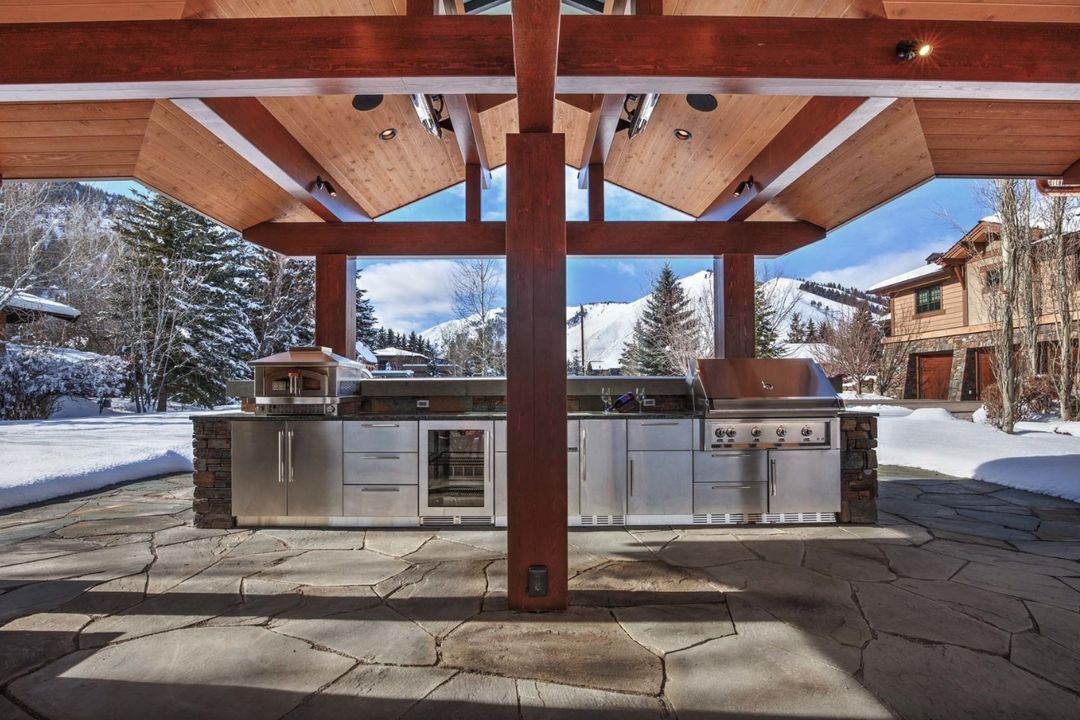 Kechum, Idado | Stainless Steel Flat Panel Weather Proof Custom Cabinetry in an outdoor kitchen