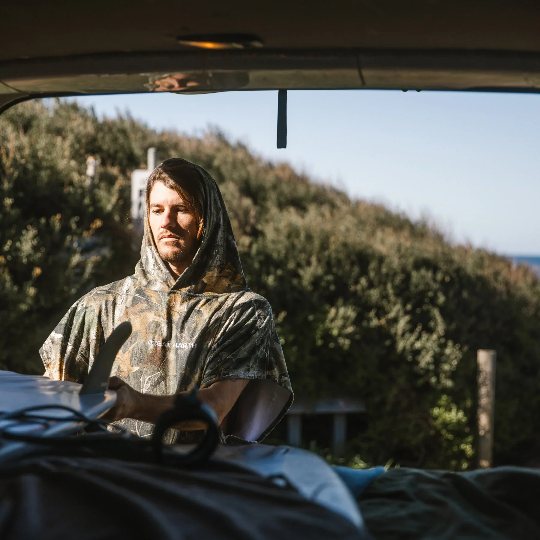 AMTW28_MENS-REAL-CAMO-HOODED-PONCHO_LIFESTYLE_1800x1800.webp