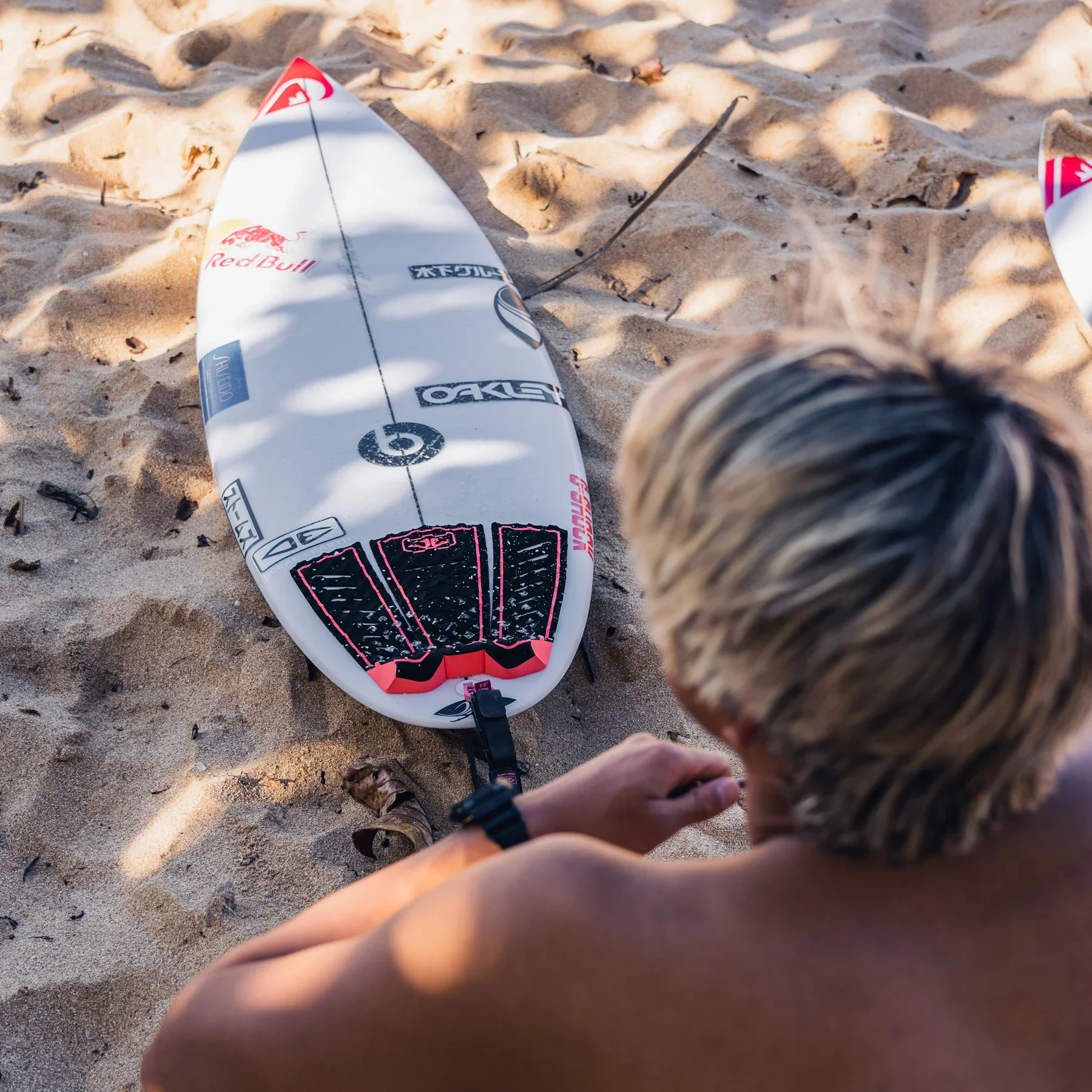 TP14-Kanoa-Igarashi-Surfboard-Tail-Pad-Black-Coral-22-Lifestyle-A_1800x1800.webp