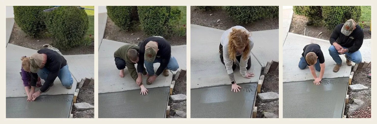 The Henegar family putting their handprints in the sidewalk of the homeplace.