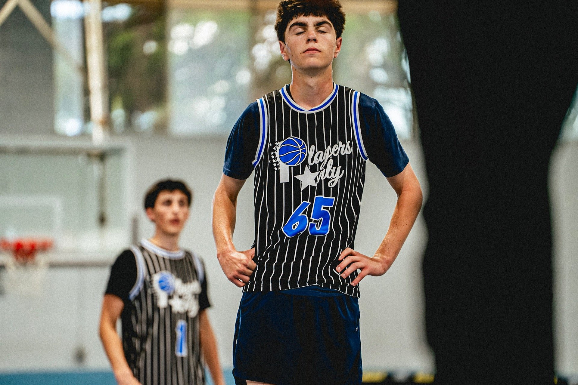 Players Only AAU basketball player wearing number 65.