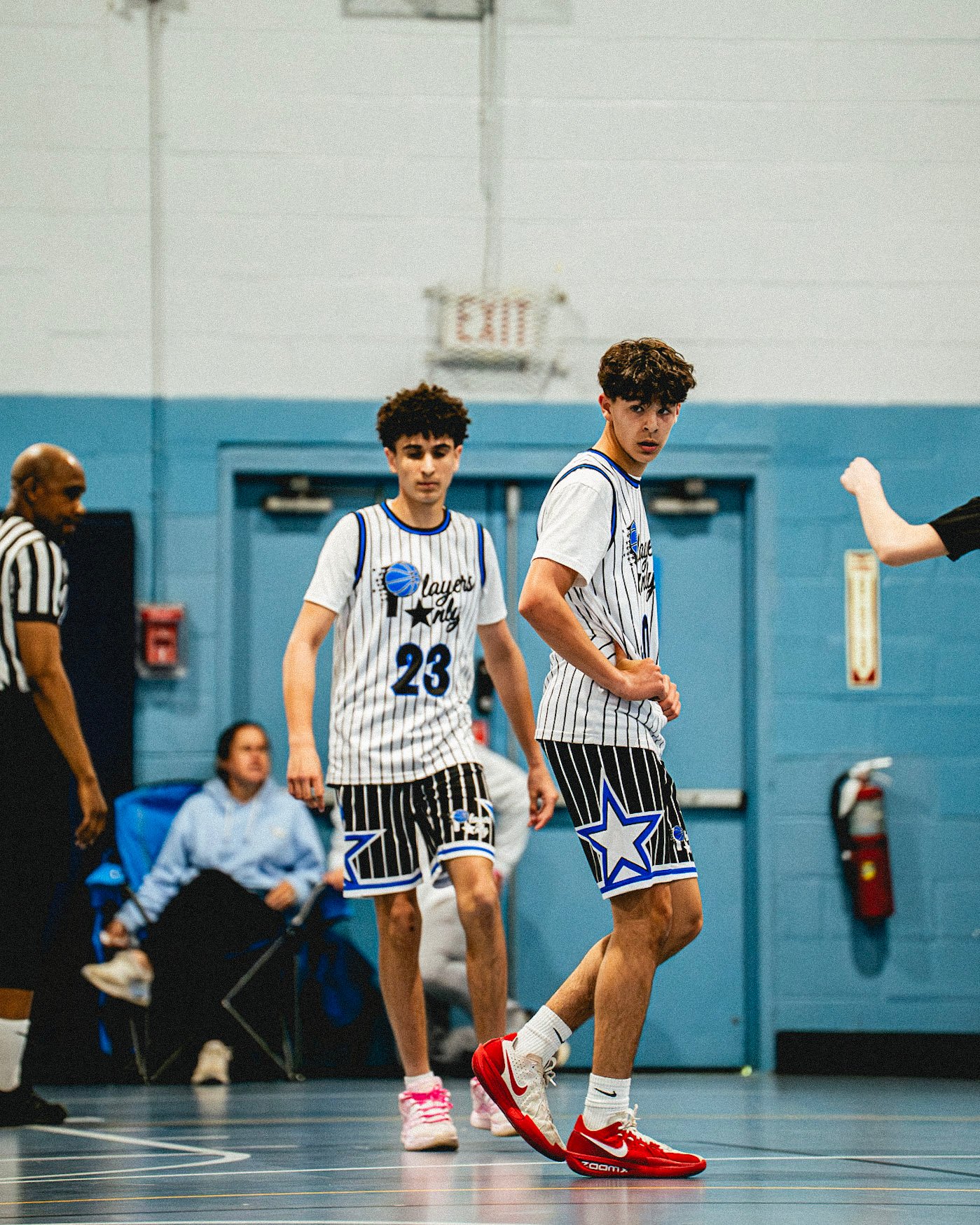 Players Only AAU basketball teammates together on the court