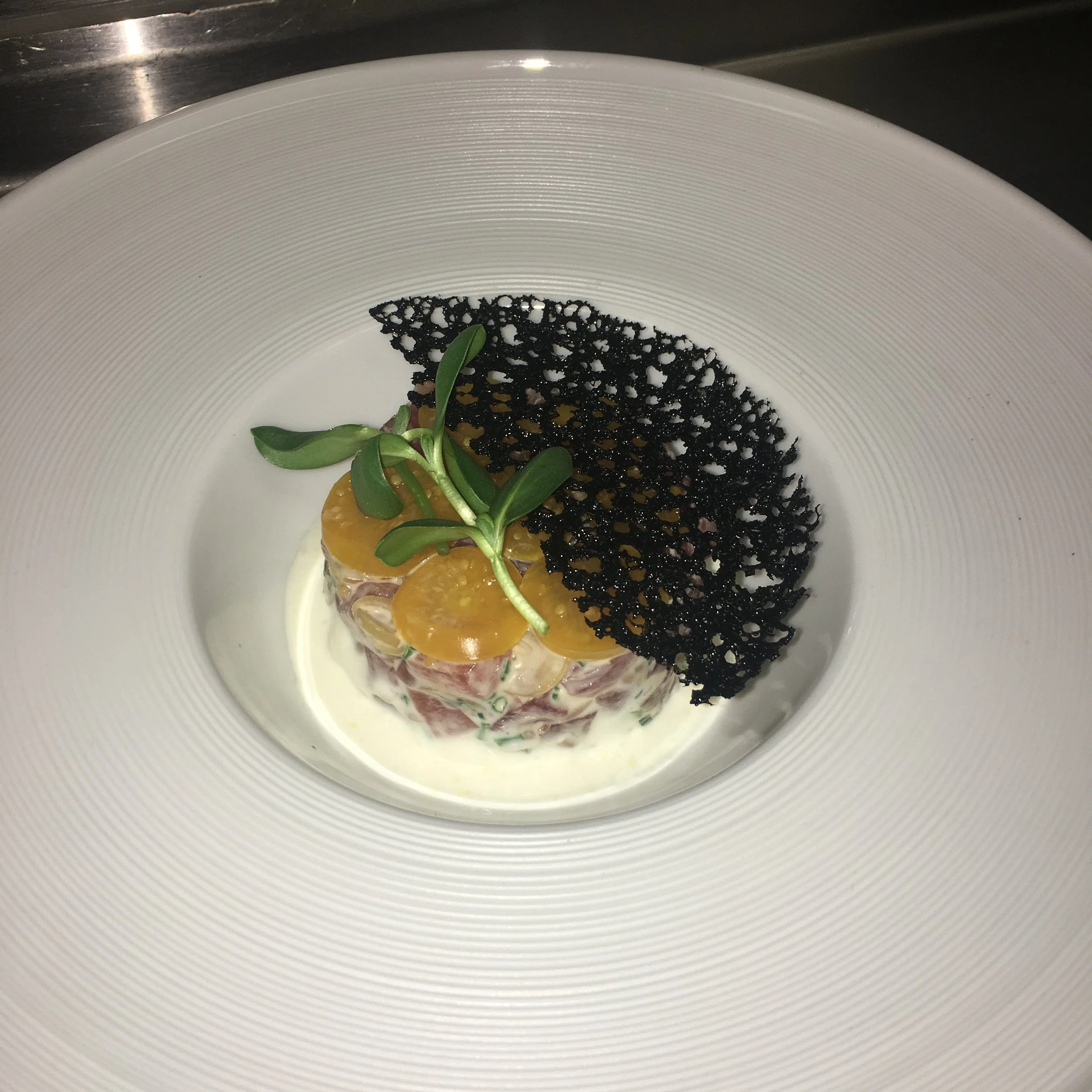 Fine dining caviar tasting course prepared by Chef David Ramos