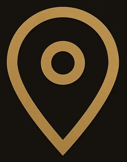 A map location pin icon with a gold outline on a black background.